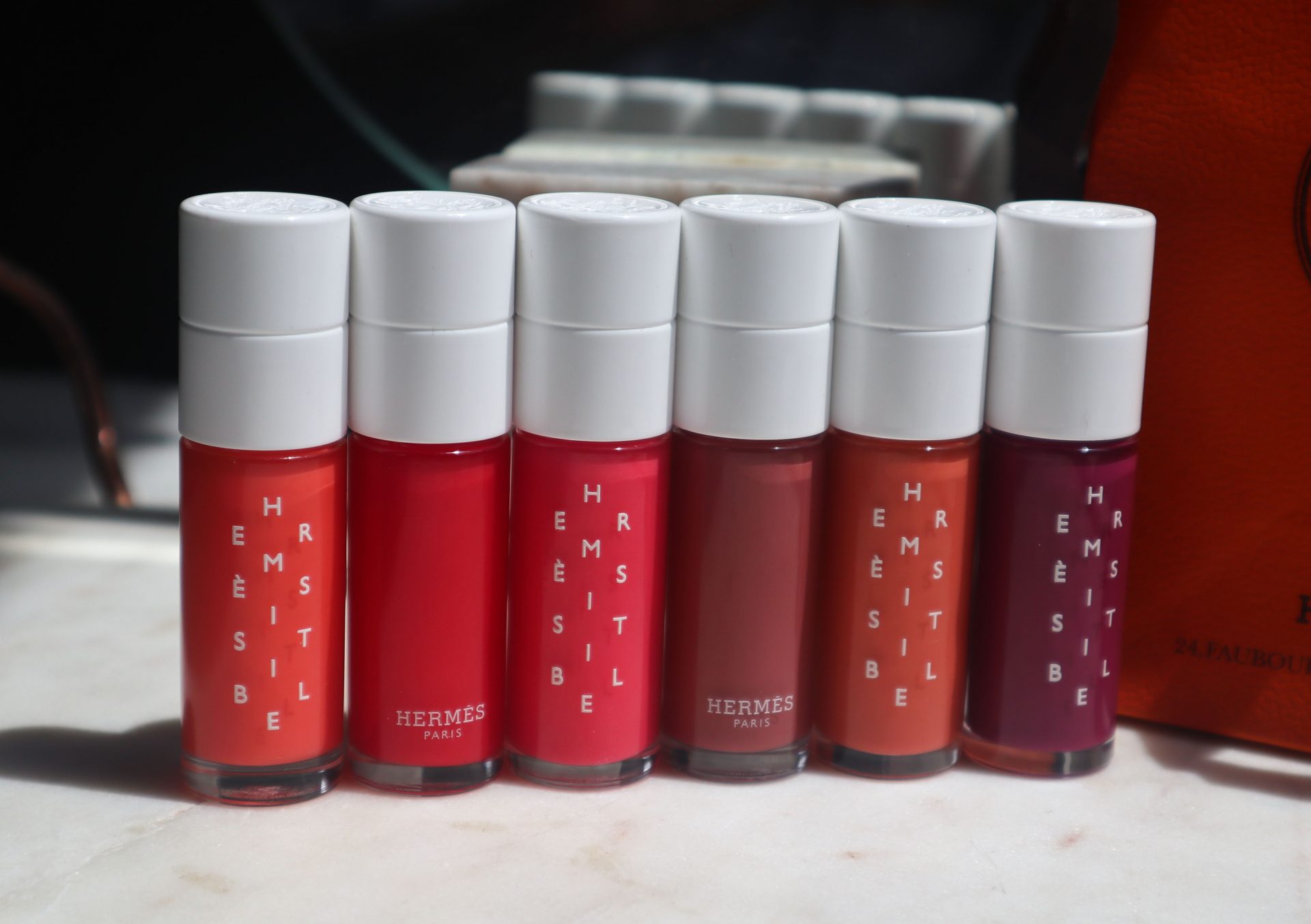 Hermes Beauty Hermesistible Infused Lip Care Oil Collection Review The Velvet Life