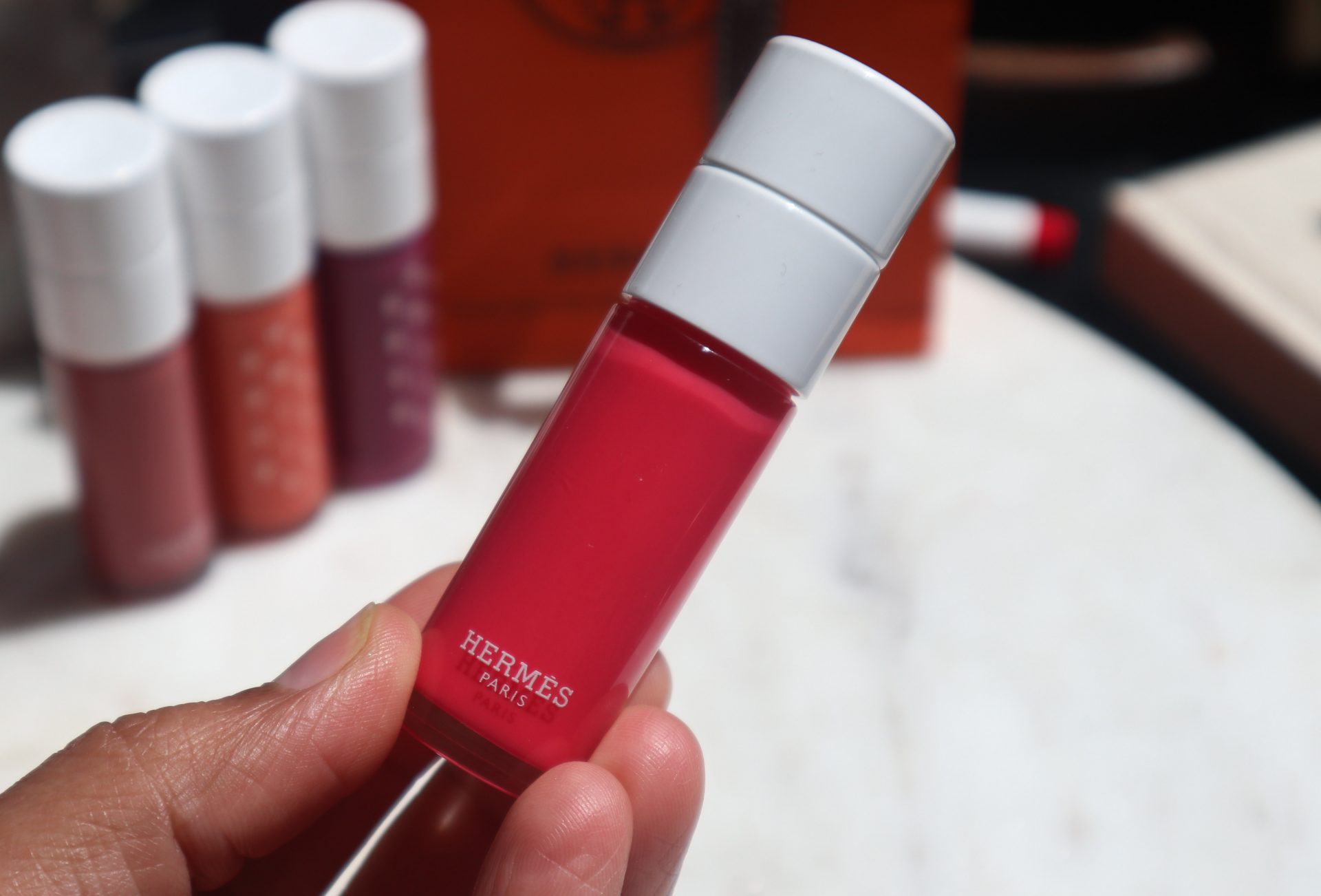 Hermes Beauty Hermesistible Infused Lip Care Oil Collection Review The Velvet Life
