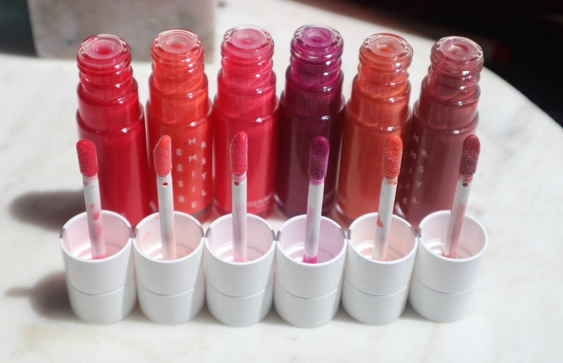 Hermes Beauty Hermesistible Infused Lip Care Oil Collection Review The Velvet Life